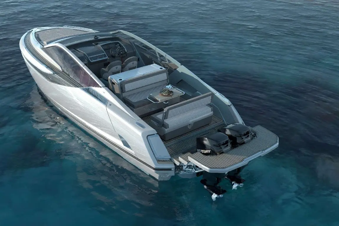 A sleek, modern motorboat with dual Mercury engines, featuring a spacious seating area and a table, floating on clear water.